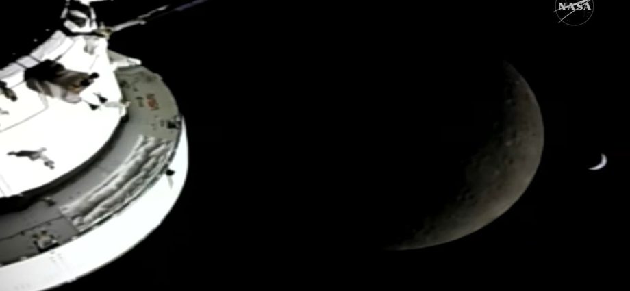 Artemis 2 astronauts fly around the moon in record-breaking lunar loop by NASA