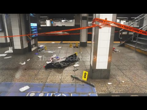 officials:-stabbings-on-new-york-subway-leaves-3-hurt-as-officers-shoot-and-kill-knife-wielding-man