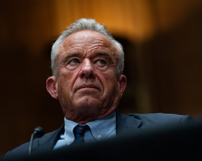 Combative, Defensive and Occasionally Contrite, Kennedy Walks a Fine Line