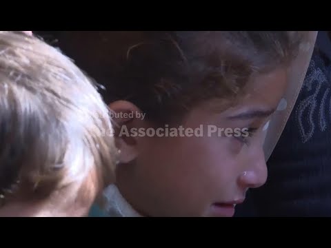 ‘live-our-lives-for-three-seconds’:-palestinians-mourn-relatives-killed-in-israeli-airstrikes