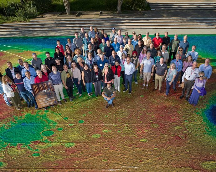 odyssey-team-celebrates-on-a-global-map-of-mars