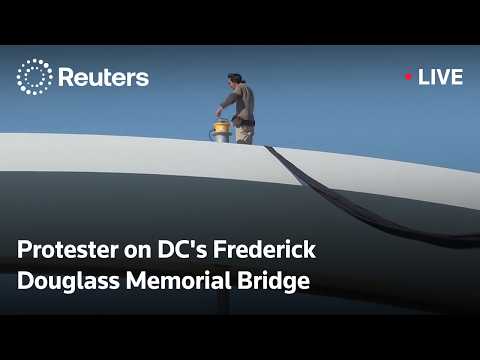 live:-protester-on-dc’s-frederick-douglass-memorial-bridge-continues