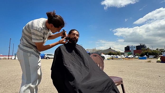 at-beirut-shoreline-camp,-volunteer-barber-brings-dignity-with-free-haircuts