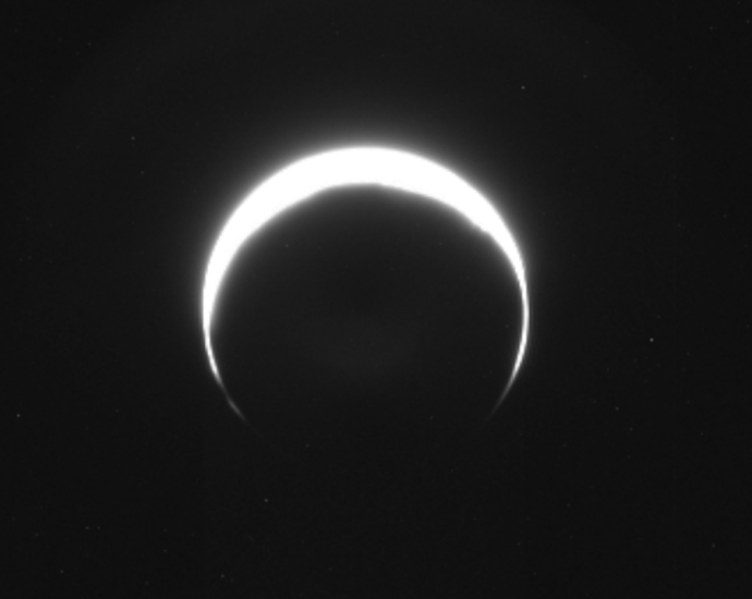 No, this isn’t a solar eclipse. It’s an image of Mars, captured by NASA’s asteroid-bound Psyche probe