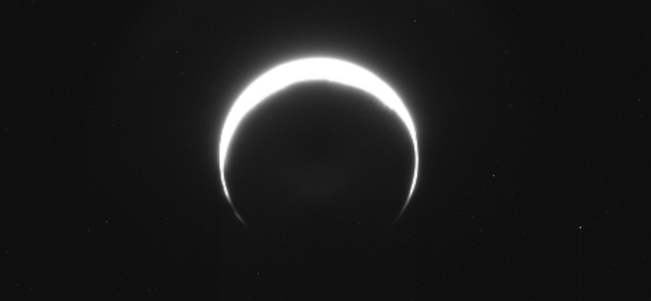 No, this isn’t a solar eclipse. It’s an image of Mars, captured by NASA’s asteroid-bound Psyche probe