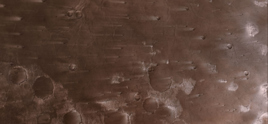 NASA’s Psyche Mission Spies Mars’ Wind-Blown Craters During Close Approach