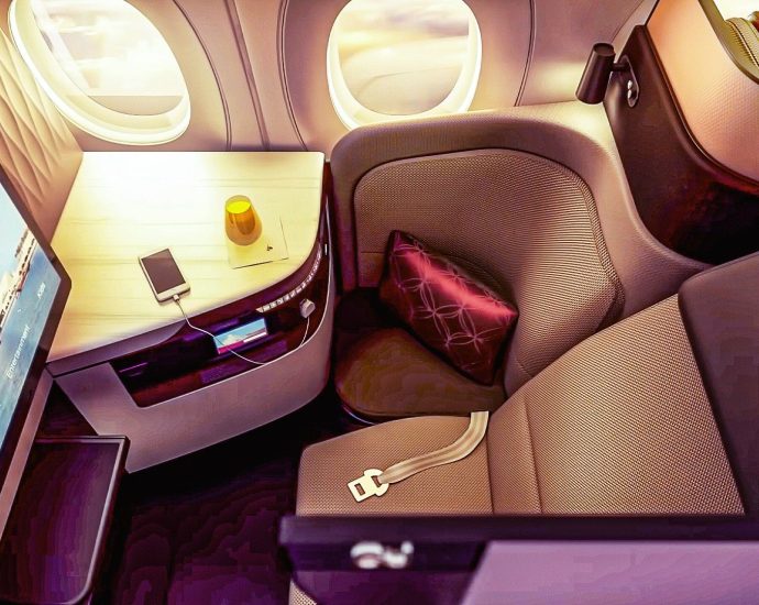 qatar-airways-qsuite-vs.-emirates-business-class:-here’s-what-you-actually-get-for-your-money-in-2026