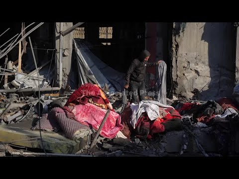 israeli-strikes-hit-two-buildings-in-central-gaza,-hospital-officials-and-residents-say