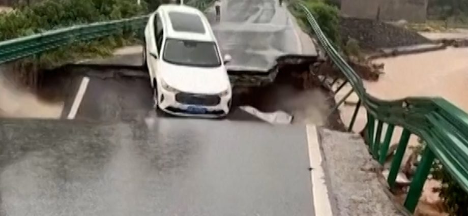 car-swept-away-by-floodwater-after-bridge-collapses-in-china