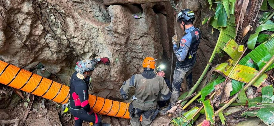 5-villagers-stuck-in-a-flooded-cave-for-more-than-a-week-found-alive-in-laos,-rescuers-say