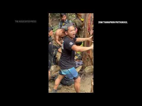 rescuers-free-4-men-trapped-in-flooded-laos-cave-as-2-still-missing