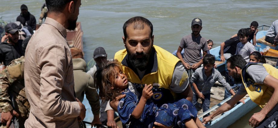 rescues-in-eastern-syria-after-the-euphrates-river-bursts-its-banks