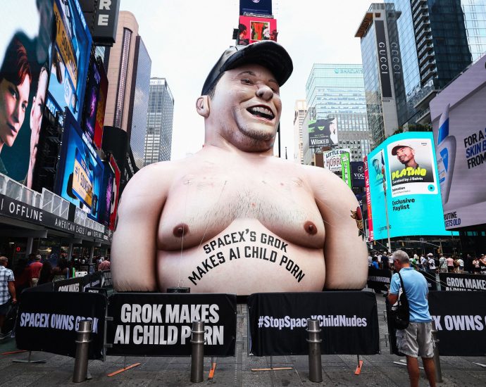massive-effigy-of-elon-musk-raised-over-times-square-to-protest-grok