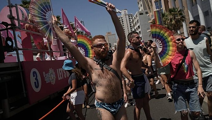 israel:-tel-aviv-pride-marchers-push-for-lgbtq+-equality-amid-tensions-and-war