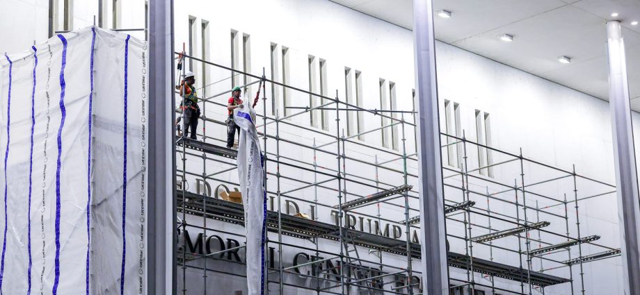 construction-workers-begin-removing-the-traitor’s-name-from-the-kennedy-center