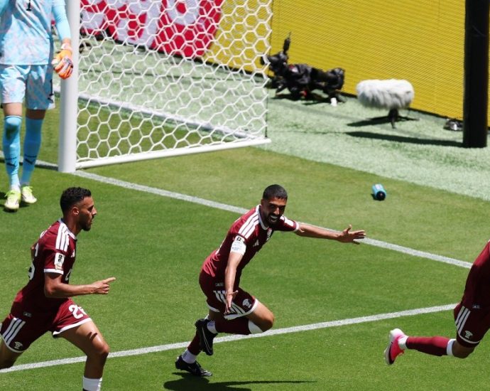 qatar-net-late-against-switzerland-to-secure-historic-first-world-cup-point