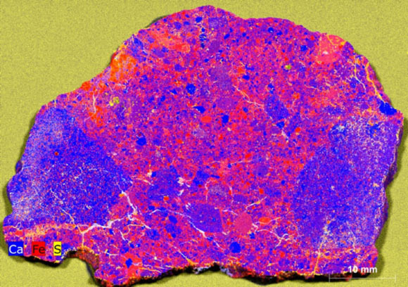 Lunar Meteorite Preserves Evidence of Colossal Asteroid Strike