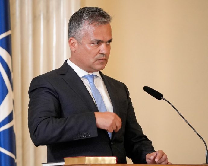 romanian-president-picks-liberal-former-mayor-as-pm-to-form-new-government