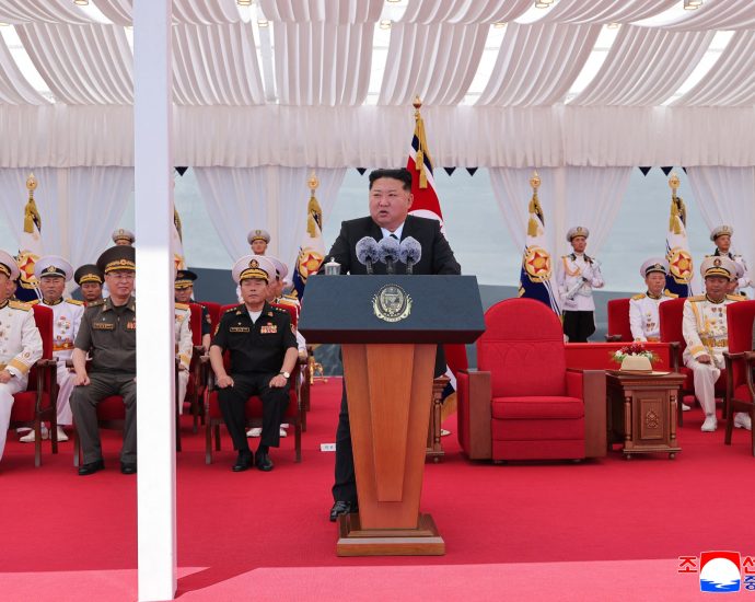 north-korea-commissions-warship-as-kim-eyes-nuclear-navy