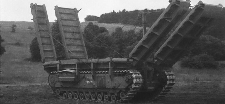 russia-is-bolting-world-war-ii-style-bridges-onto-armored-tractors.-they’re-slow—and-ukraine’s-drones-are-fast