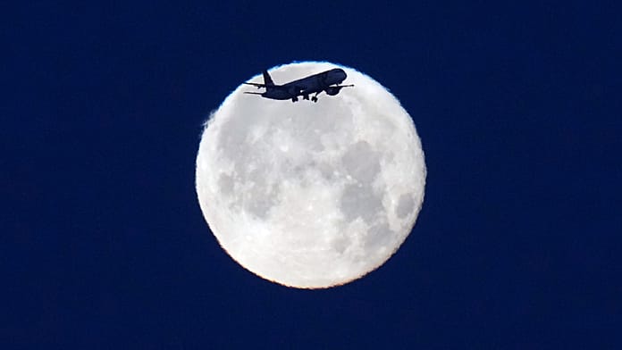 rare-strawberry-moon-shines-over-lisbon