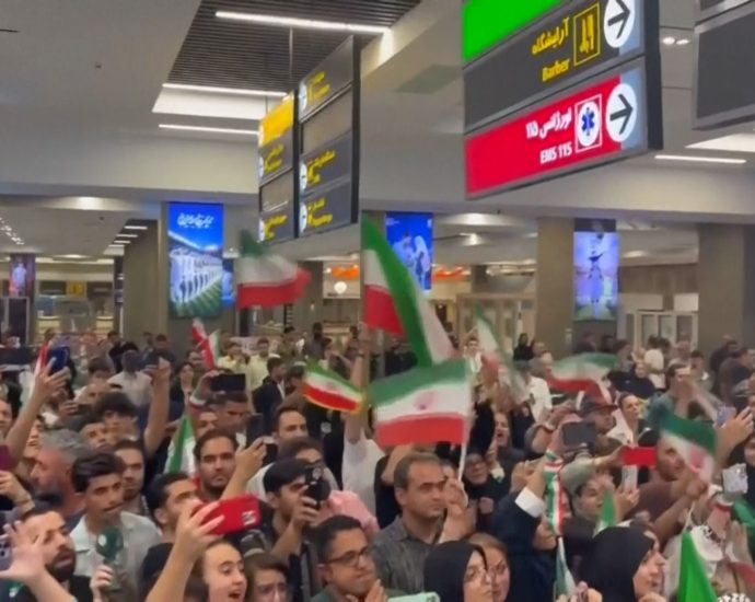 iran-football-team-welcomed-home-after-world-cup-exit