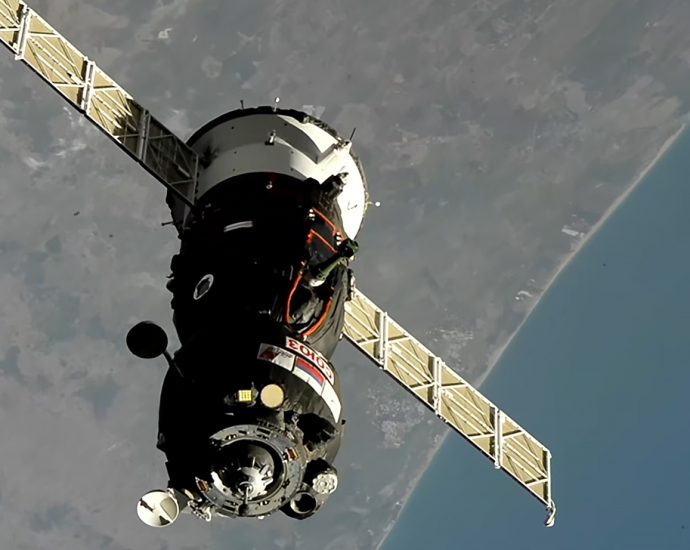 soyuz-docks-to-station,-hatches-open-soon-for-crew-greeting