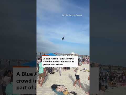 blue-angels-jet-flies-low-over-crowd-on-florida-beach