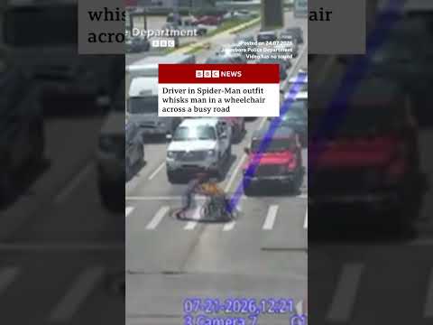 driver-in-spider-man-outfit-helps-man-in-wheelchair-across-busy-road.-#bbcnews-#us