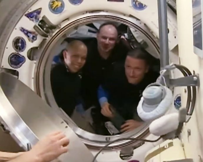 expedition-74-crewmates-board-soyuz-and-close-hatch-for-departure