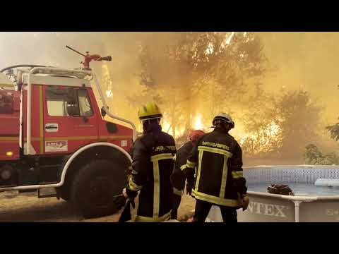spain,-france-race-to-control-wildfires-as-tens-of-thousands-flee