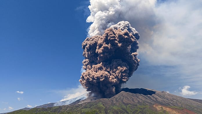 drone-footage-shows-mount-etna-cable-car-above-volcanic-landscape