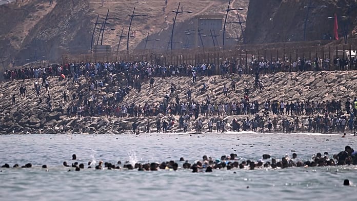 thousands-of-migrants-storm-ceuta-border-from-morocco