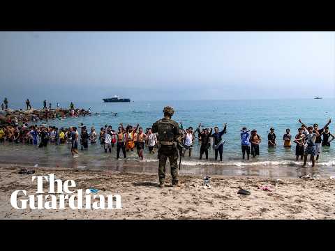 tens-of-thousands-of-migrants-cross-into-spanish-enclave-from-morocco