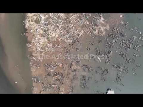 prolonged-drought-reveals-a-village-buried-beneath-an-indonesian-water-reservoir
