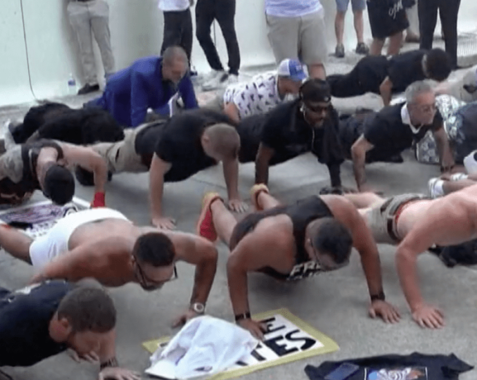 tate-supporters-rally-for-brothers-ahead-of-bail-hearing-in-miami