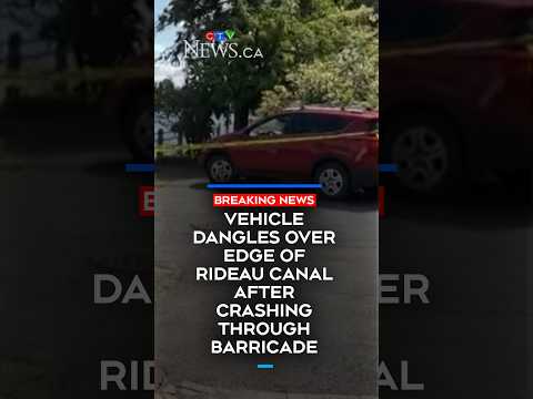 vehicle-crashes-through-fence-and-dangles-over-rideau-canal