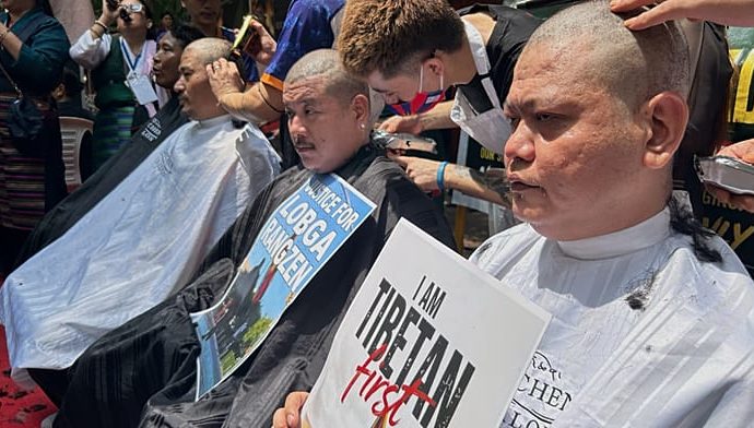 tibetan-protesters-in-new-dehli-denounce-china-with-shaved-heads-and-prayers