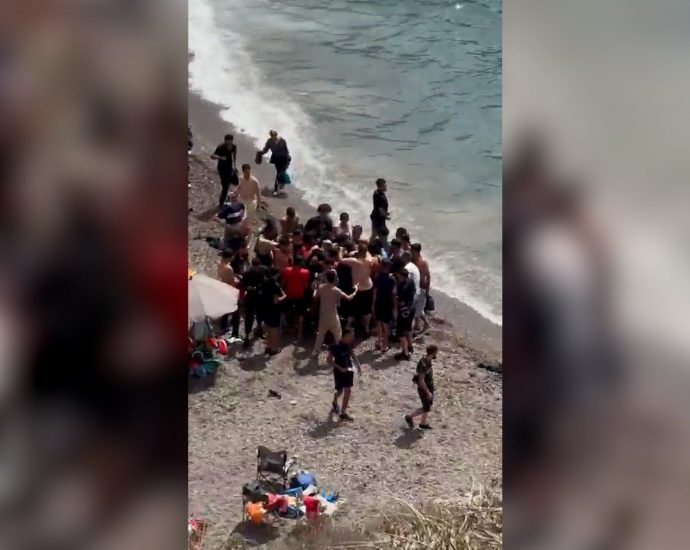dozens-of-migrants-land-on-spanish-coast-surprising-beachgoers