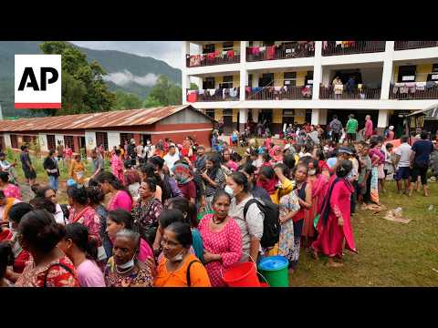 families-displaced-by-nepal-floods-seek-shelter-and-supplies-at-relief-centers