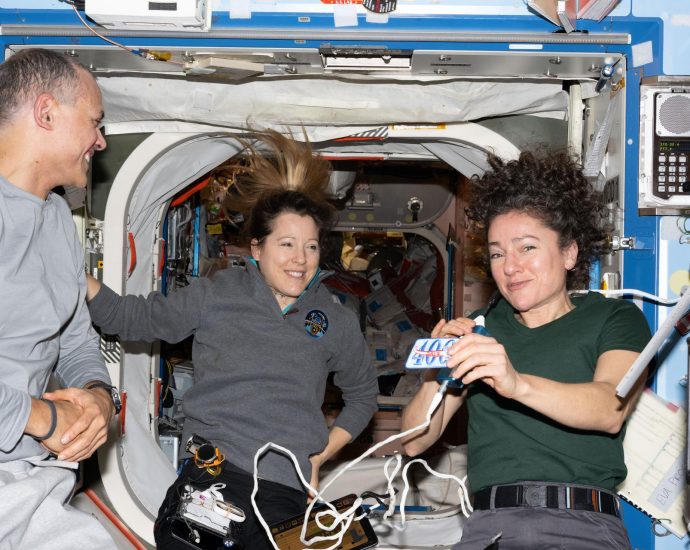crew-studies-medicine-and-physics,-works-on-spacesuits-and-earth-photo-gear