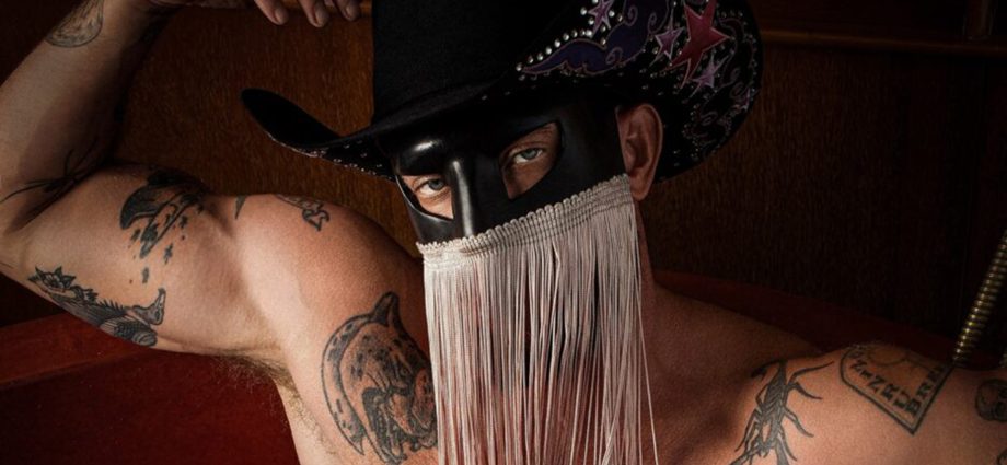orville-peck-makes-history,-baring-all-but-his-face-for-‘playgirl’-cover