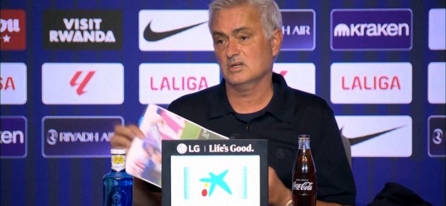 mourinho-holds-up-images-of-‘two-clear-red-cards’-after-atletico-defeat