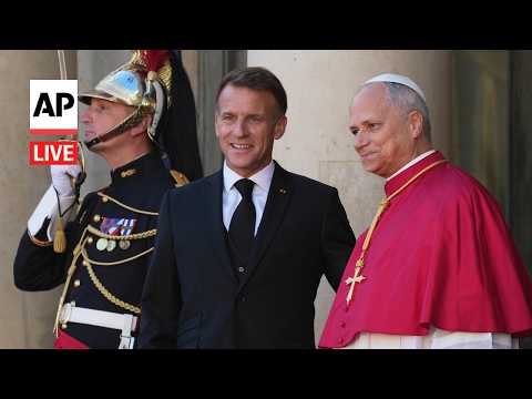 live:-pope-leo-xiv-arrives-in-france,-welcomed-by-macron-on-historic-visit