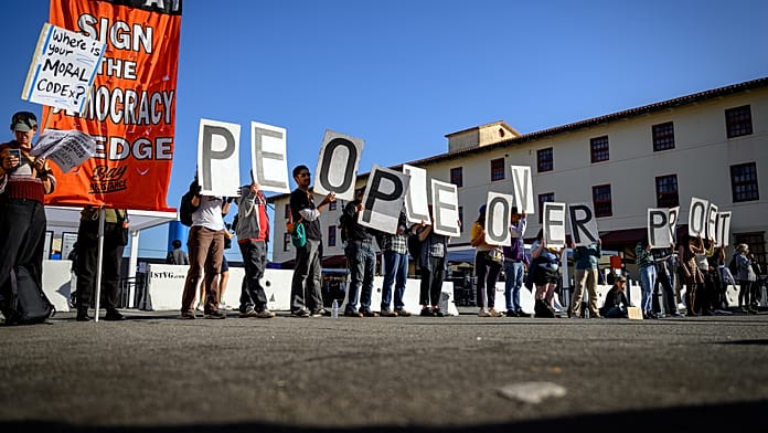 ‘let-workers-have-a-say’:-protesters-target-openai-conference
