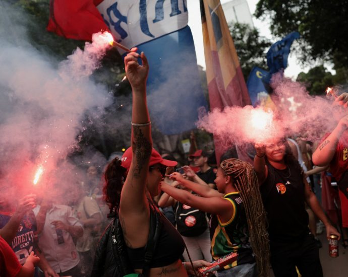 ‘no-to-the-father,-no-to-the-son’:-thousands-march-in-rio-against-bolsonaro