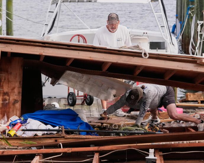 isaias-weakens,-but-flooding-threat-and-outages-persist