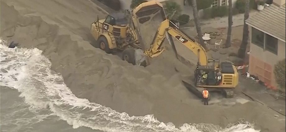 waves-crash-into-homes-as-excavators-try-to-protect-california-properties