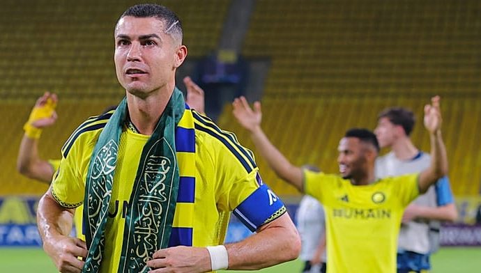 ronaldo-waves-saudi-flag-scarf-after-missile-alert-delays-asian-champions-league-match-in-riyadh