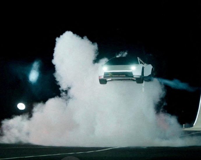 tesla-unveils-car-that-can-drive-upside-down-and-jump-through-the-air